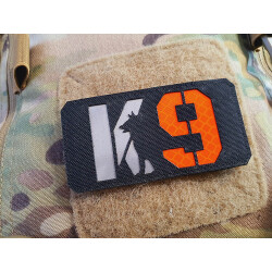 JTG K9 LaserCut Patch, schwarz, Cordura, reflektierendes Logo und Schriftzug, mit Klettrückseite